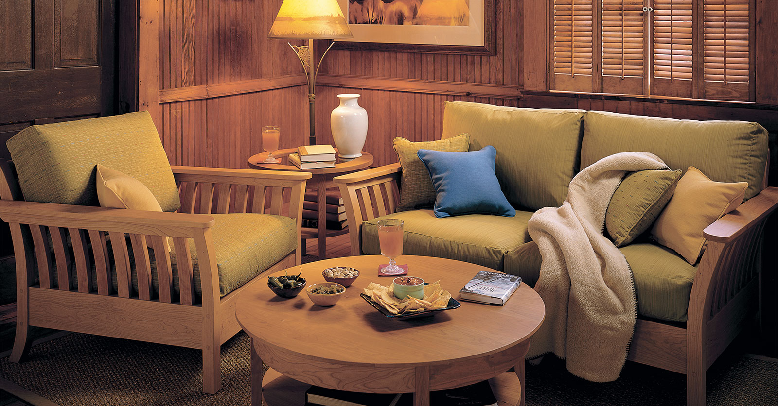 cozy living room corner with snacks and drinks on the coffee table