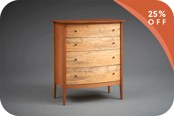 dresser with different wood on drawers than the rest of the piece