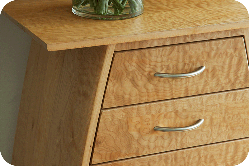 close up of dresser with cool figured light color wood